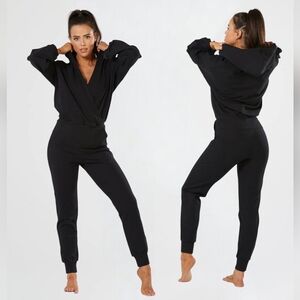 NAMA women's black Enlighten Onesie size L